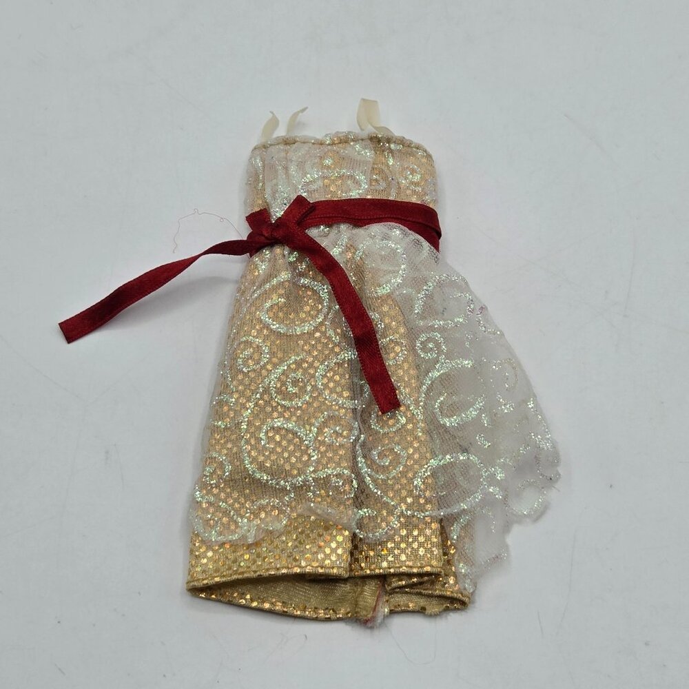 Holiday Sparkle Barbie Dress Gold With Red Ribbon